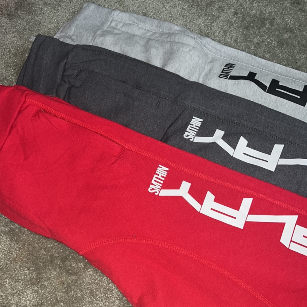 3 pairs of premium joggers. red, light grey and charcoal